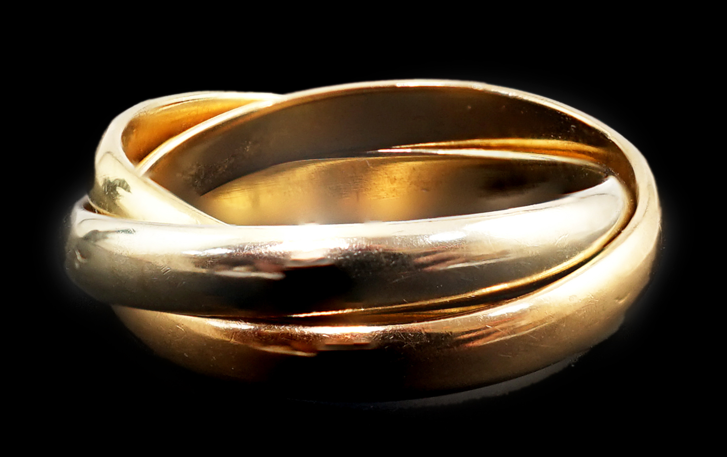 A 1980's French Cartier three colour 18k gold 'Russian' wedding ring